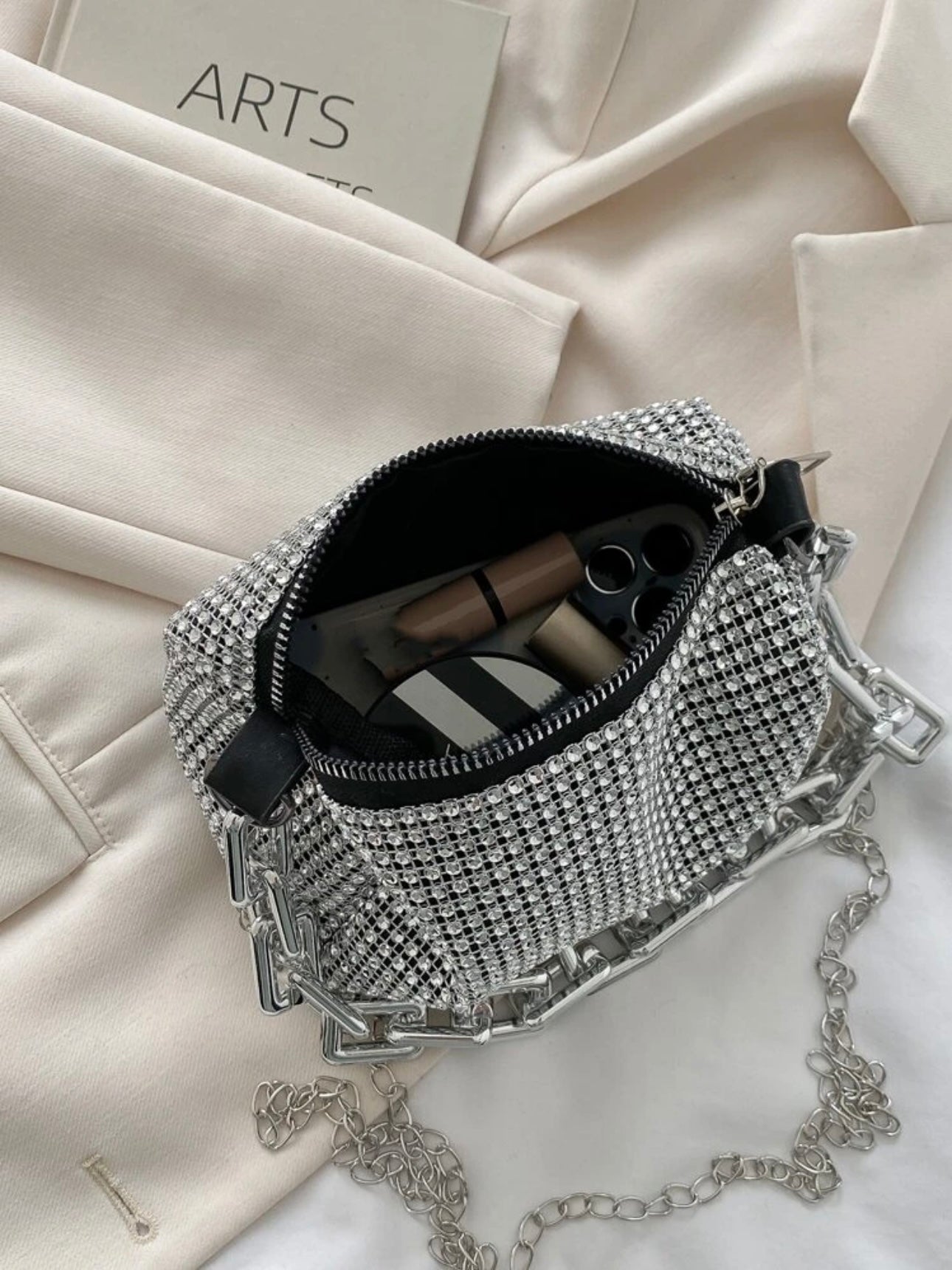 Sparks | Pochette con brillo