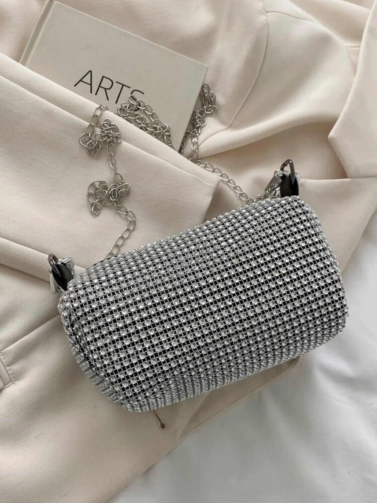 Sparks | Pochette con brillo